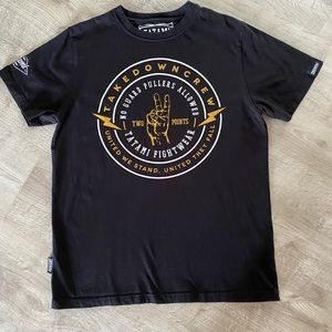 Authentic Tatami Fighting Apparel United Kingdom Size Large
Black Short sleeves